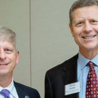 Two guests posing at the Foundation Annual Meeting